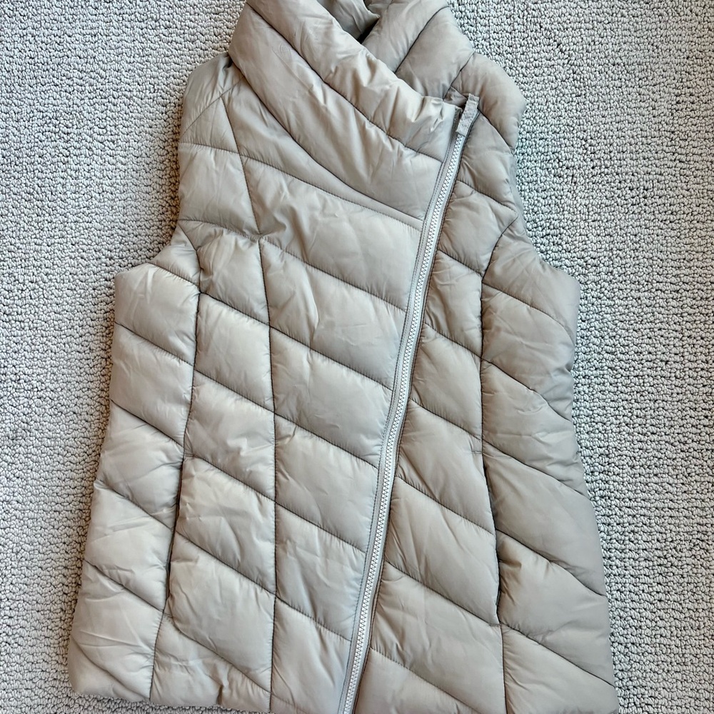 Cream Quilted Vest with High Collar and Asymmetrical Zipper
